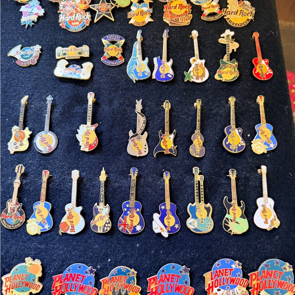 Hard Rock Cafe Guitar Pin Collection with Blue and Gold Accents